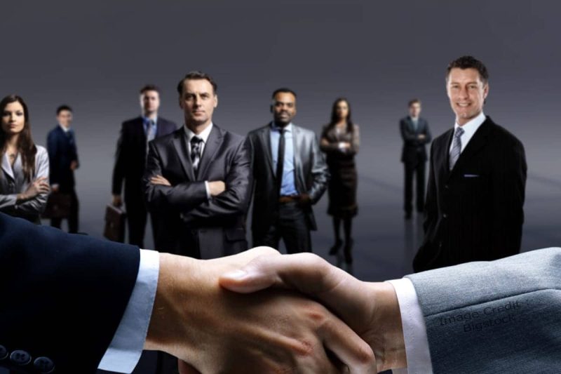 handshake isolated on business background