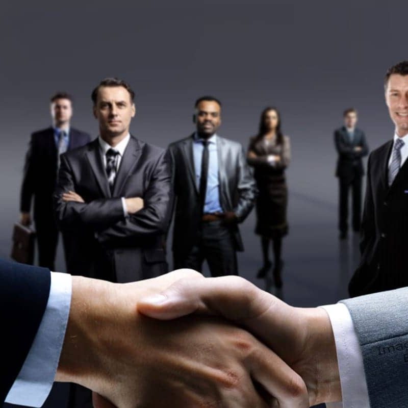 handshake isolated on business background